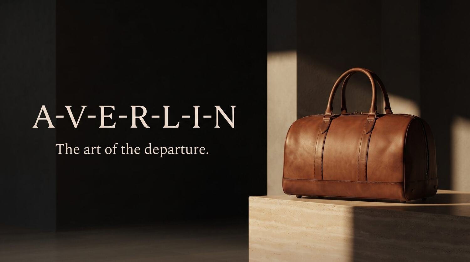 AVERLIN cognac leather weekender on a travertine plinth